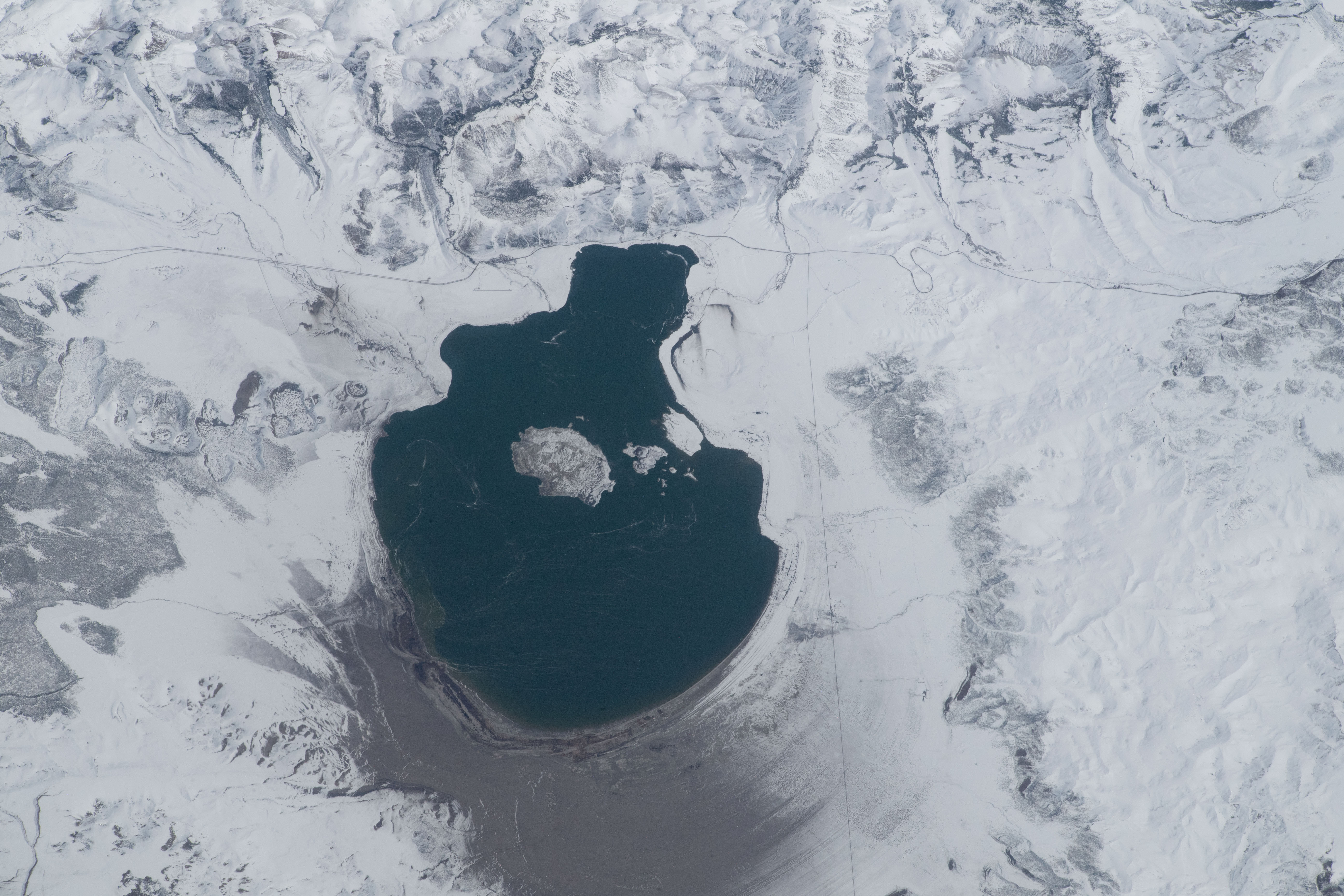 A snow-surrounded Mono Lake in Mono County in California was pictured by NASA astronaut and Expedition 69 Flight Engineer Woody Hoburg from the International Space Station as it orbited 262 miles above.