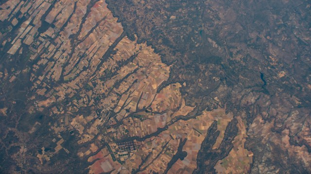 Agricultural activities are etched in the western portion of the Brazilian state of Bahia which is part of the Cerrado, a vast tropical savanna in the South American nation. The International Space Station was orbiting at an altitude of 264 miles at the time of this photograph.