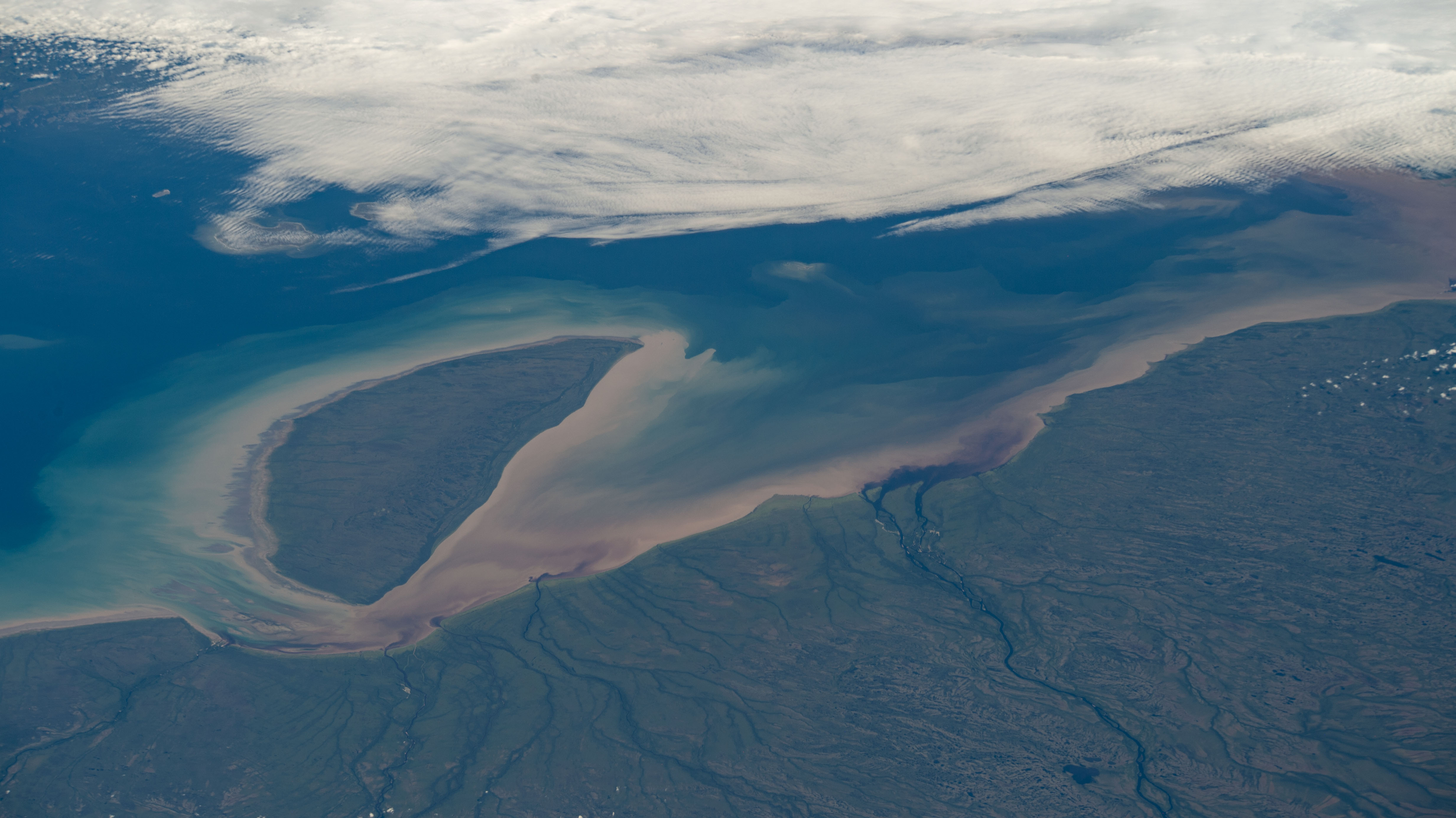 Akimiski Island in James Bay and off the coast of Ontario is pictured from the International Space Station as it orbited 260 miles above Canada.
