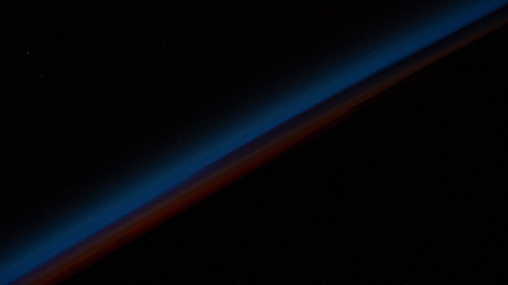 An orbital sunset is pictured from the International Space Station as it was soaring 267 miles above the south Pacific Ocean.