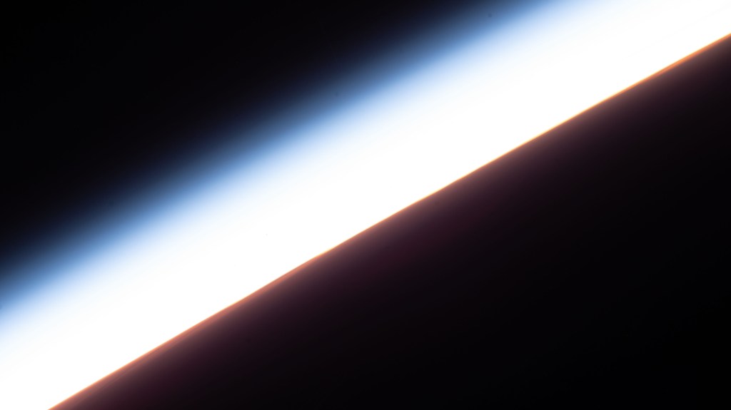 An orbital sunset is pictured from the International Space Station as it was soaring 267 miles above the south Pacific Ocean.