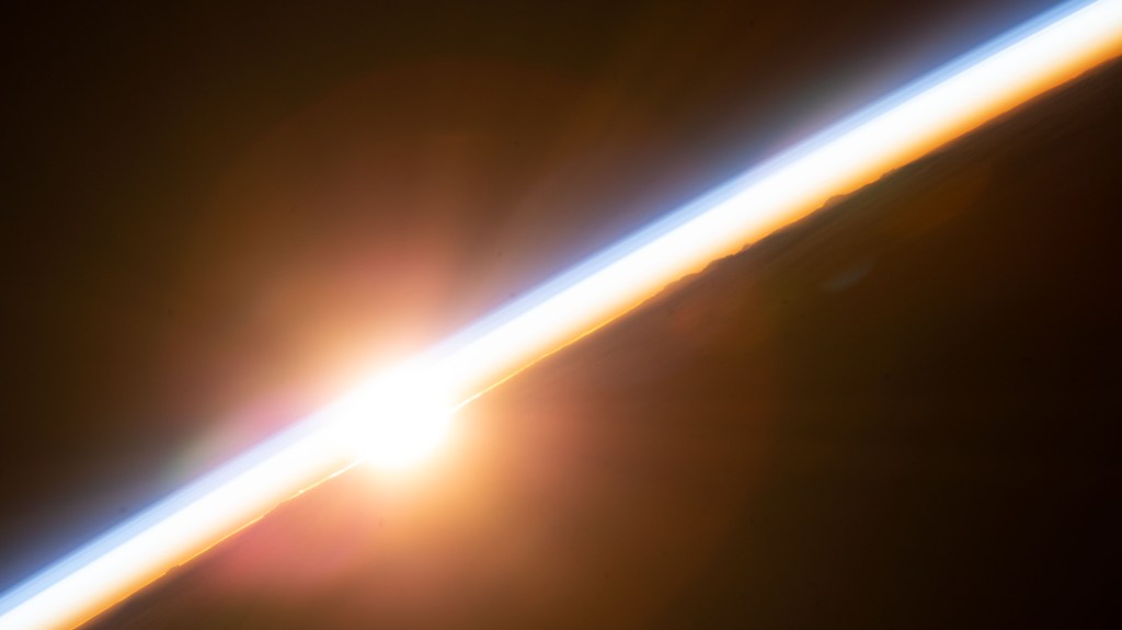 An orbital sunset is pictured from the International Space Station as it was soaring 267 miles above the south Pacific Ocean.