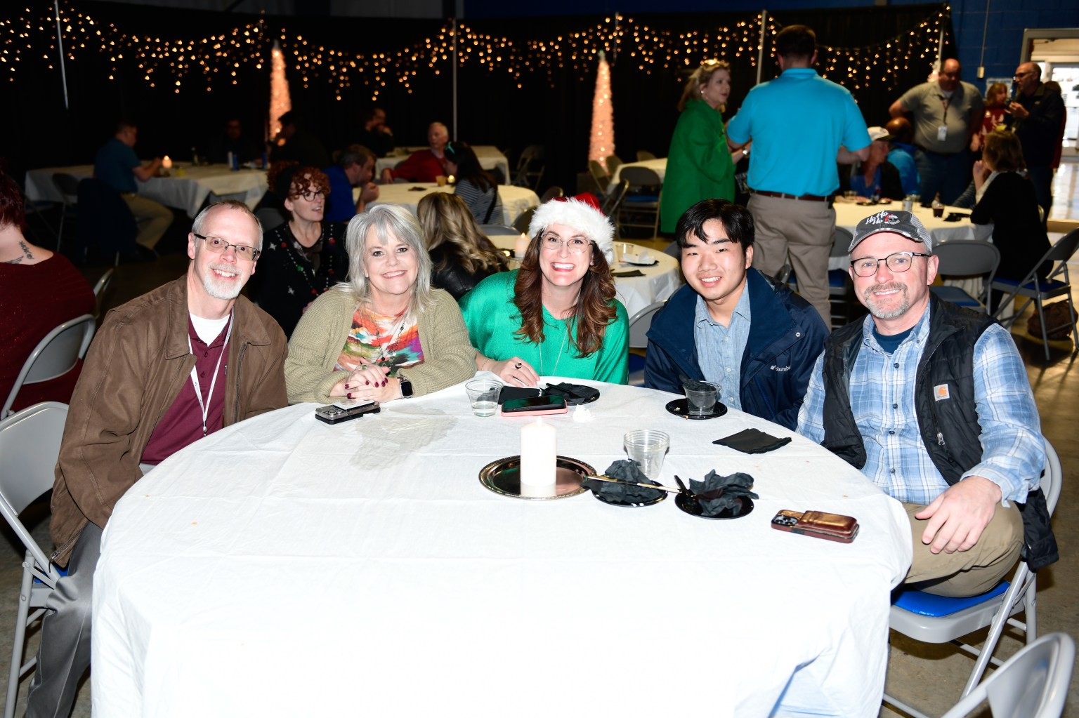 Marshall team members gather at the center’s holiday reception Dec. 7 in Activities Building 4316. From left are Cory Brown, Leigh Martin, Lisa Watkins, Shaun Baek, and Randy Silver.