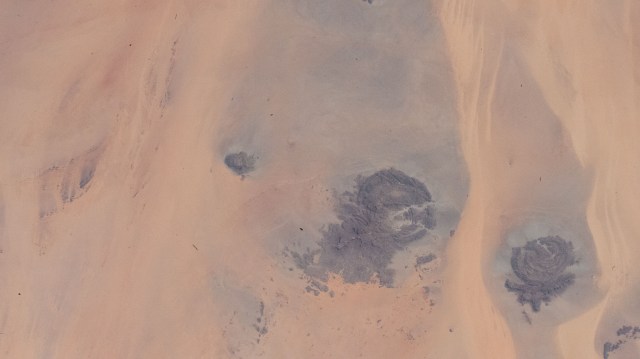 This portion of the Western Desert is an area of the Sahara where the borders of Egypt, Libya, and Sudan meet. The International Space Station was orbiting 259 miles above north Africa at the time of this photograph.