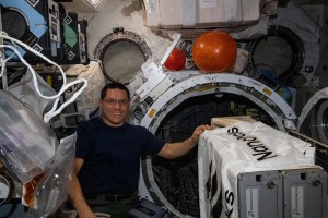 NASA astronaut and Expedition 69 Flight Engineer Frank Rubio works to install the NanoRacks CubeSat Deployer inside the Kibo laboratory module's airlock. After the airlock is depressurized, the Japanese robotic arm grapples the deployer and places it outside in the vacuum of microgravity pointing it away from the International Space Station. CubeSats from private, governmental, and academic organizations are then deployed into Earth orbit for a variety of research objectives.