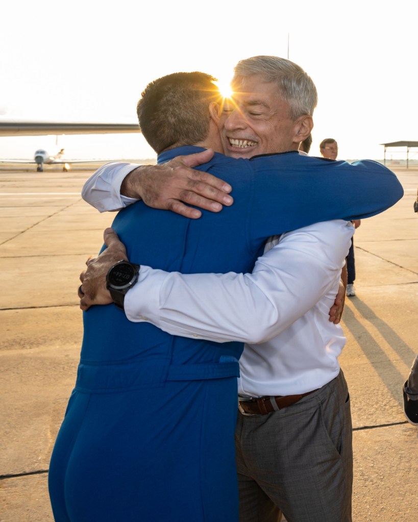 NASA astronaut Frank Rubio is greeted by fellow NASA astronaut Mark Vande Hei following his arrival at Ellington Field in Houston, Texas, aboard a NASA jet. Rubio had just completed a 371-day mission aboard the International Space Station the day before, breaking Vande Hei's previous single spaceflight record of 355 days set back on March 30, 2022.