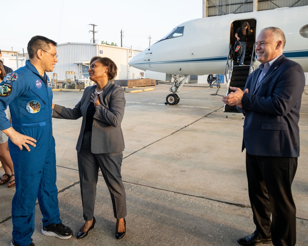 NASA astronaut Frank Rubio is greeted by Johnson Space Center Director Vanessa Wyche following his arrival at Ellington Field in Houston, Texas, aboard a NASA jet. Rubio had just completed a 371-day mission aboard the International Space Station the day before.