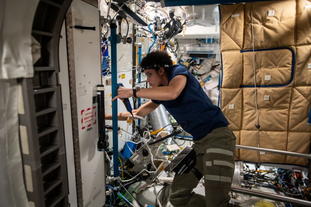 NASA astronaut and Expedition 67 Flight Engineer Jessica Watkins is pictured during maintenance operations inside the International Space Station's Tranquility module.