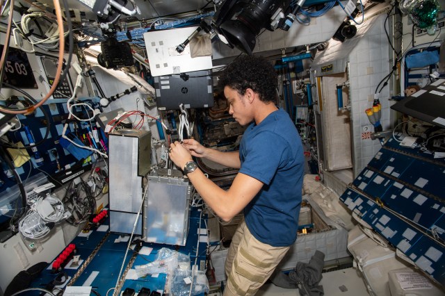 Expedition 67 Flight Engineer and NASA astronaut Jessica Watkins works on electrical system components inside the International Space Station's Harmony module.