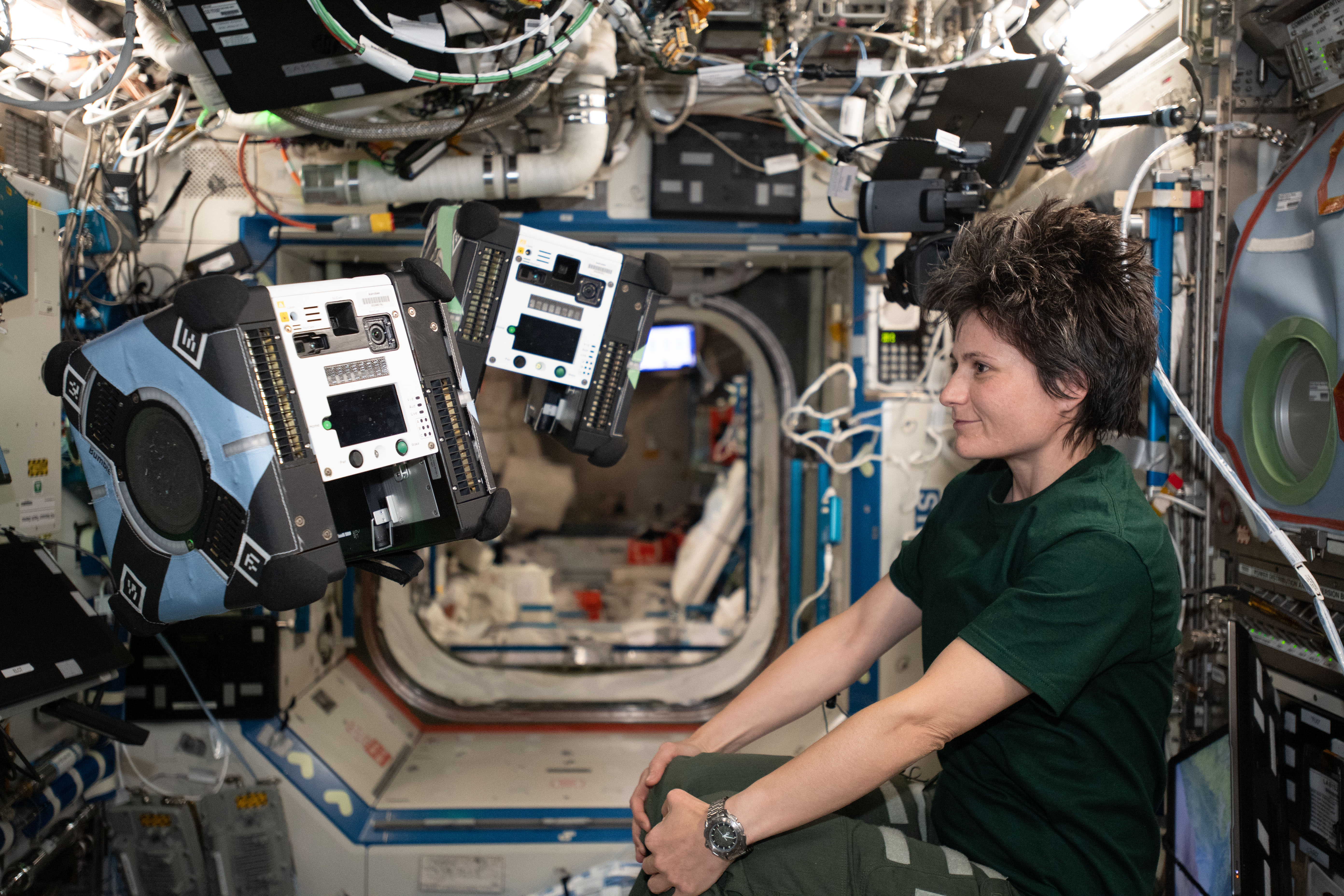 ESA (European Space Agency) astronaut and Expedition 67 Flight Engineer Samantha Cristoforetti monitors a pair of Astrobee robotic free-flyers performing autonomous maneuvers inside the International Space Station. The cube-shaped, toaster-sized robots are designed to help scientists and engineers develop and test technologies for use in microgravity to assist astronauts with routine chores, and give ground controllers additional eyes and ears on the space station.