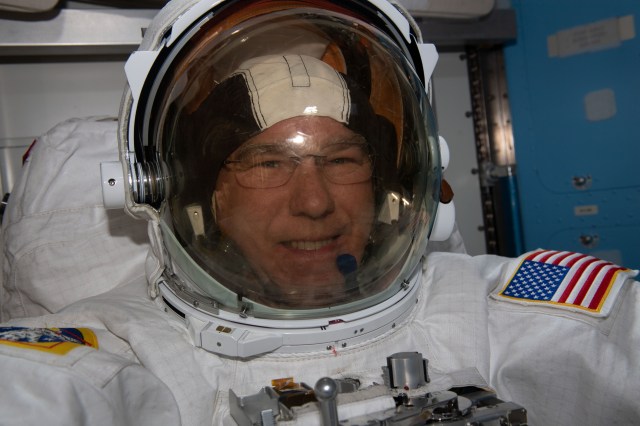 NASA astronaut and Expedition 69 Flight Engineer Stephen Bowen is pictured trying on his Extravehicular Mobility Unit, or spacesuit, and testing it ahead of a spacewalk planned for Friday, April 28. Bowen, along with UAE (United Arab Emirates) astronaut Sultan Alneyadi, will spend about six-and-a-half hours in the vacuum of space continuing to upgrade the International Space Station’s power generation system readying the orbiting lab for its next set of roll-out solar arrays.