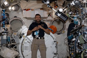 UAE (United Arab Emirates) astronaut and Expedition 69 Flight Engineer Sultan Alneyadi is pictured in the International Space Station's Kibo laboratory module during a public affairs event with government officials, public and private employees, and students from the UAE.