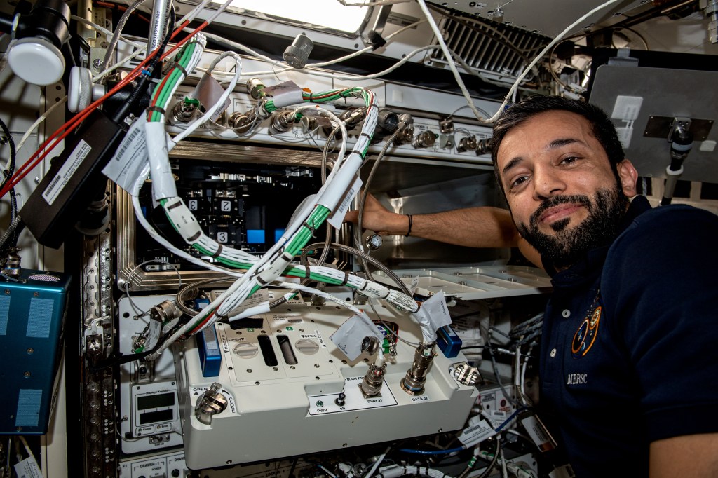 UAE (United Arab Emirates) astronaut and Expedition 69 Flight Engineer Sultan Alneyadi works on space biology research hardware located inside the International Space Station's Kibo laboratory module.