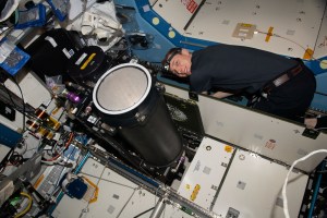 NASA astronaut and Expedition 69 Flight Engineer Woody Hoburg works inside the International Space Station's Destiny laboratory module and replaces life support system components.