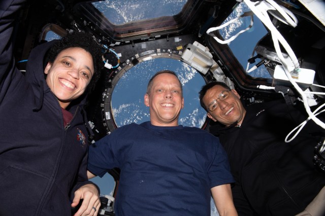 Expedition 67 Flight Engineers (from left) Jessica Watkins, Bob Hines, and Frank Rubio, all three NASA astronauts, pose for a portrait together inside the cupola, the International Space Station's "window to the world."