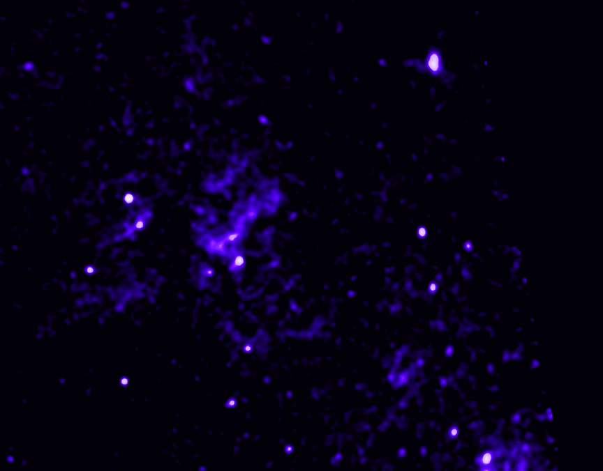 A gif of two images of a blue against black from Chandra and the red/pink is overlaid on top.