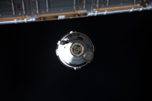 Boeing's CST-100 Starliner crew ship approaches the International Space Station on the company's Orbital Flight Test-2 mission before automatically docking to the Harmony module's forward port.