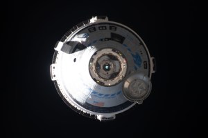 Boeing's CST-100 Starliner crew ship approaches the International Space Station on the company's Orbital Flight Test-2 mission before automatically docking to the Harmony module's forward port.