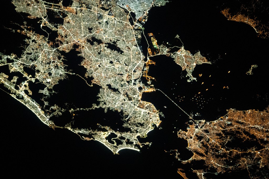 Rio De Janeiro, Brazil's second-most populous city, is pictured during an orbital night pass from the International Space Station as it orbited 261 miles above. Boat lights can be seen dotted along the Guanabara Bay.