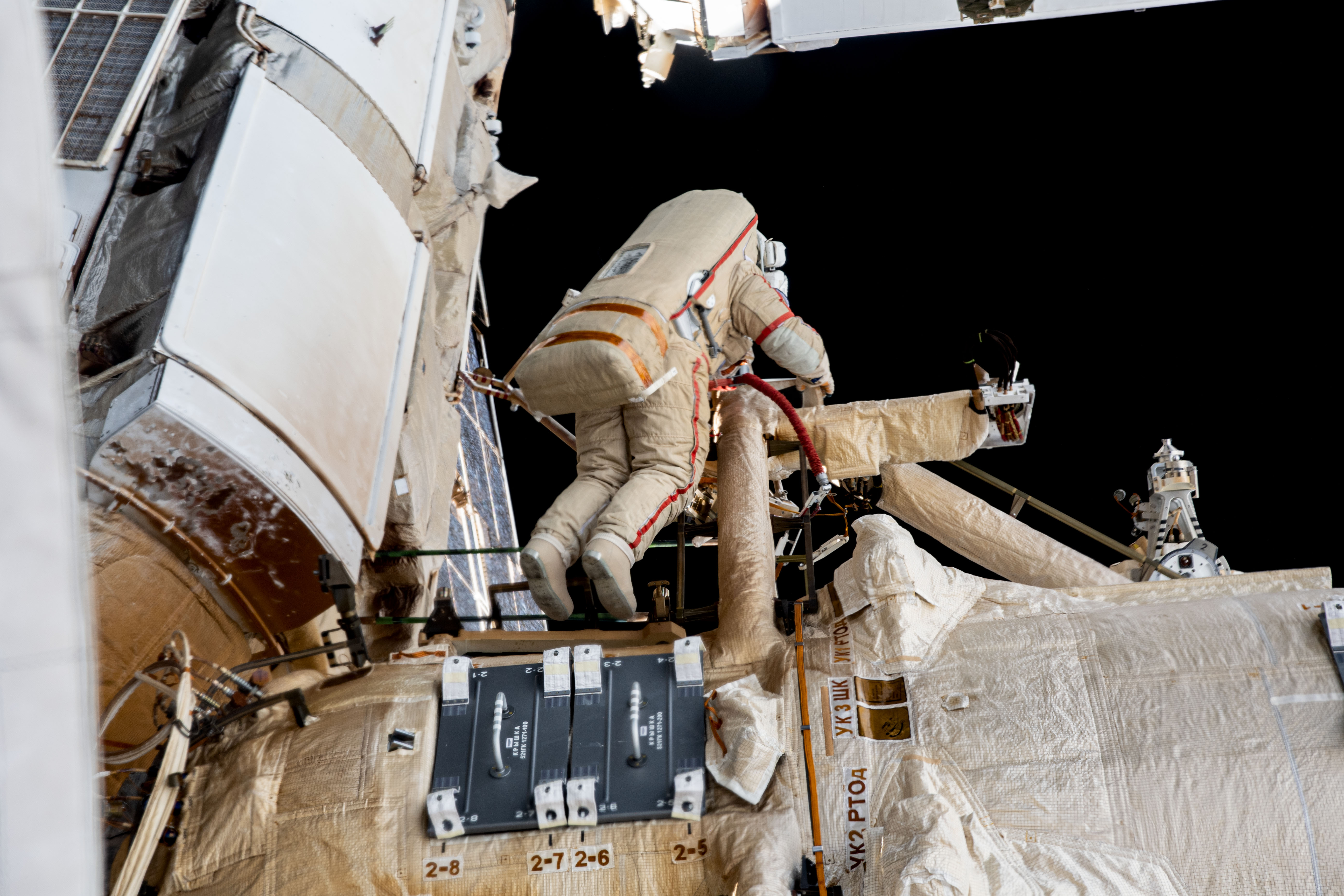 Roscosmos cosmonaut and Expedition 69 Flight Engineer Sergey Prokopyev is pictured in his Orlan spacesuit during a six-hour and 35-minute spacewalk to install orbital debris shields and relocate a portable workstation on the International Space Station.
