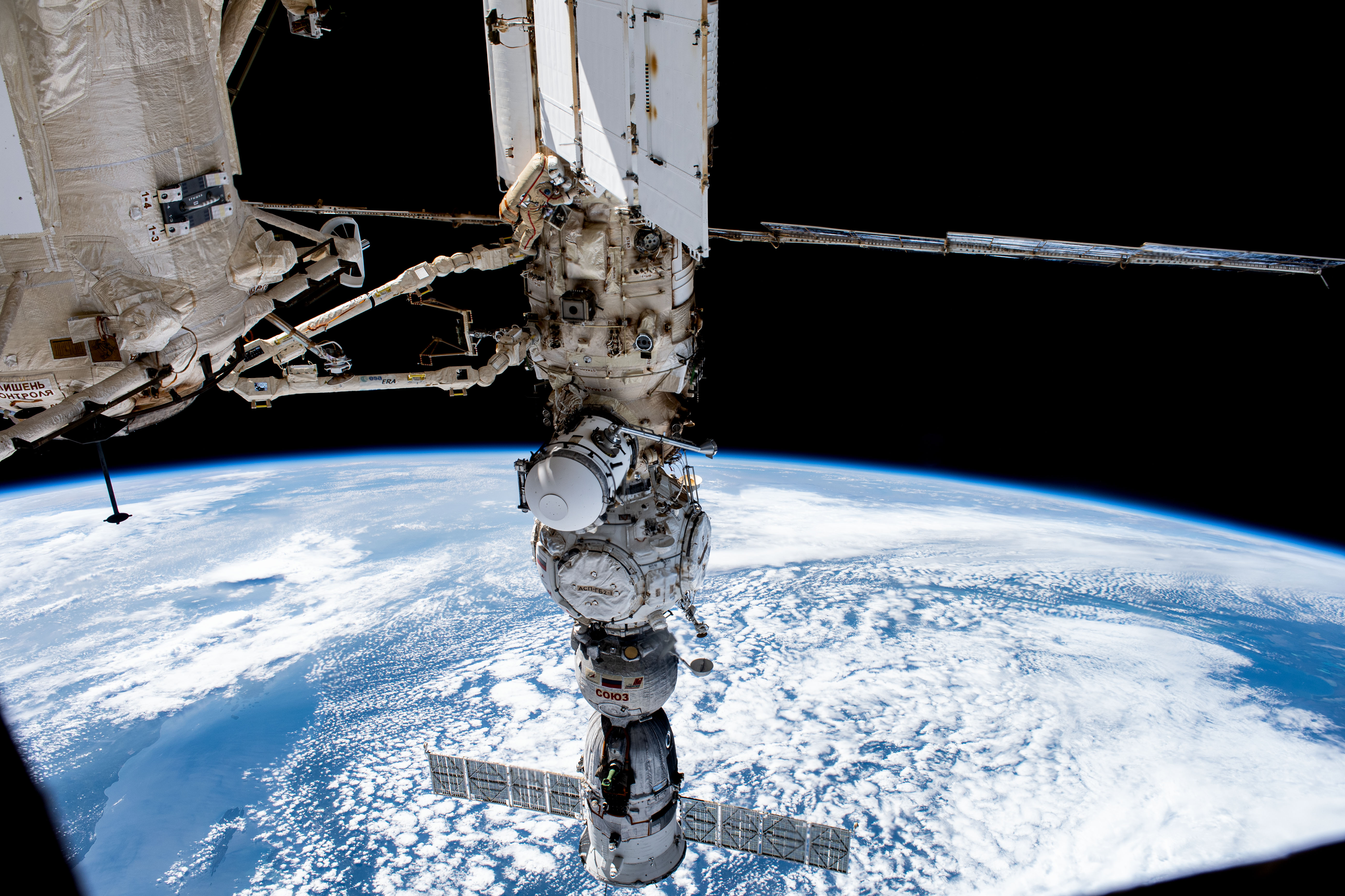 Roscosmos cosmonaut and Expedition 69 Flight Engineer Sergey Prokopyev is pictured in his Orlan spacesuit during a six-hour and 35-minute spacewalk to install orbital debris shields and relocate a portable workstation on the International Space Station. The European robotic arm extends from the Nauka science module to which the Prichal module and the Soyuz MS-23 crew ship are attached.