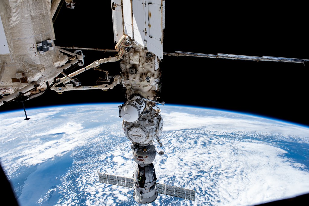 Roscosmos cosmonaut and Expedition 69 Flight Engineer Sergey Prokopyev is pictured in his Orlan spacesuit during a six-hour and 35-minute spacewalk to install orbital debris shields and relocate a portable workstation on the International Space Station. The European robotic arm extends from the Nauka science module to which the Prichal module and the Soyuz MS-23 crew ship are attached.