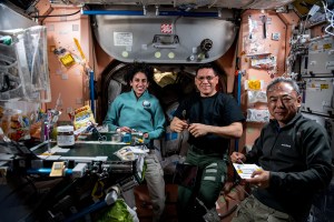 Expedition 69 Flight Engineers (from left) Jasmin Moghbeli and Frank Rubio, both from NASA, and Satoshi Furukawa of JAXA (Japan Aerospace Exploration Agency) join each other for lunch aboard the International Space Station's Unity module.