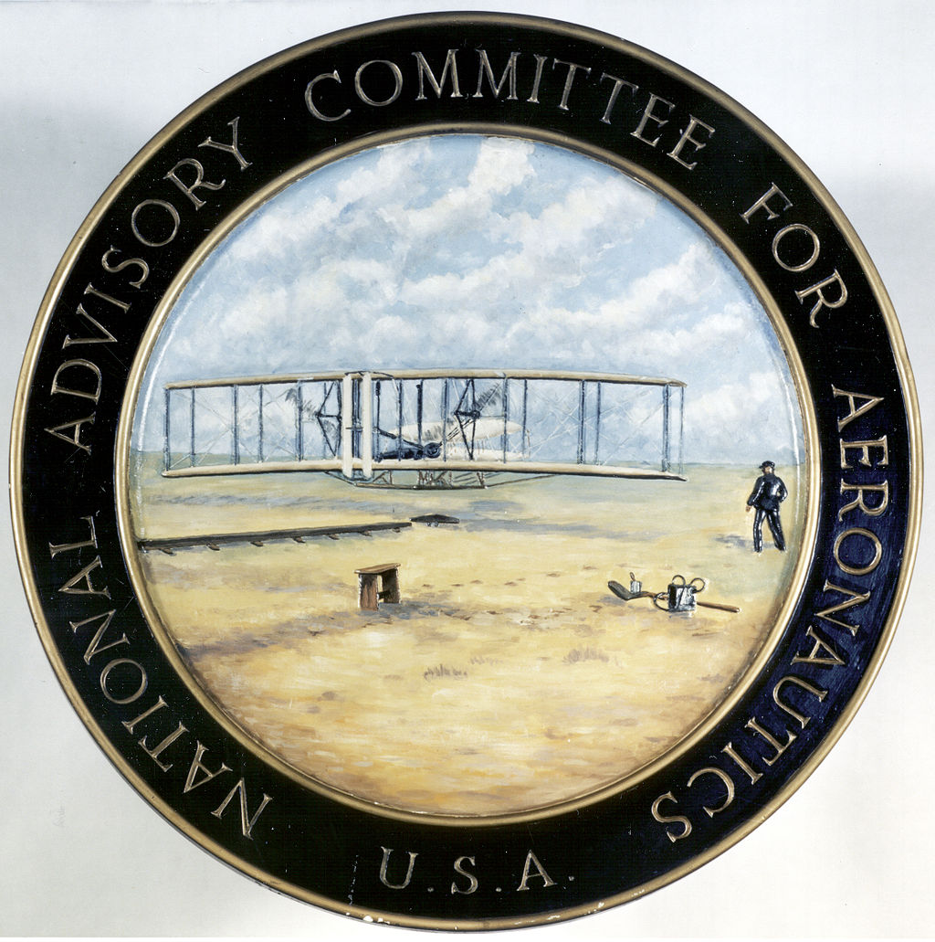 Seal of NACA, including an illustration of the first flight at Kitty Hawk