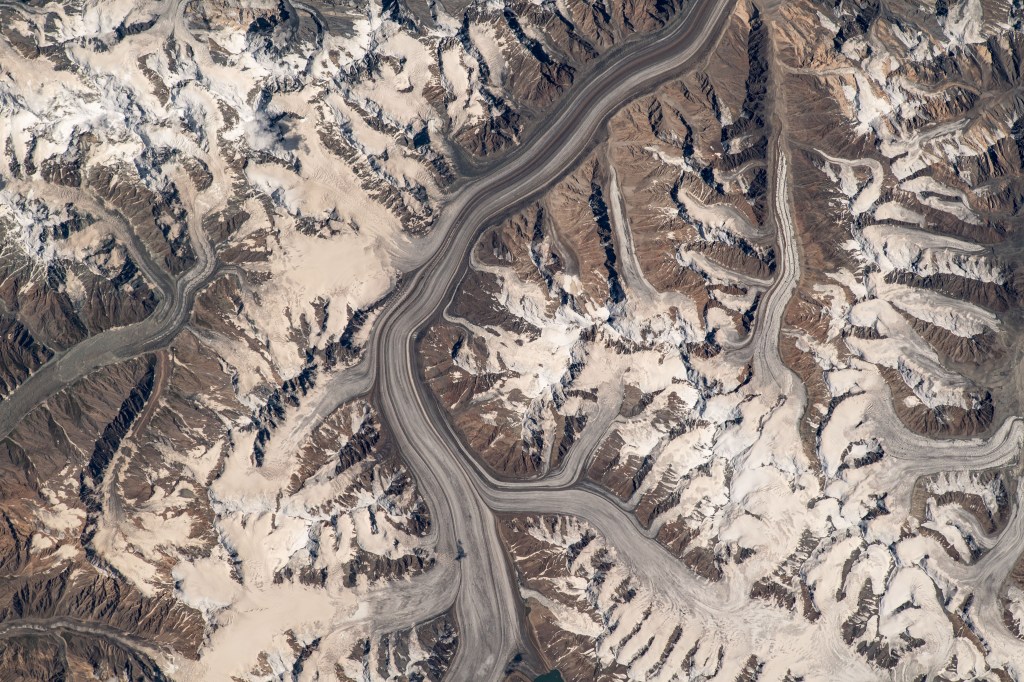 Glaciers in the Pamir mountain range located in The Republic of Tajikistan are pictured from the International Space Station as it orbited 264 miles above Central Asia.