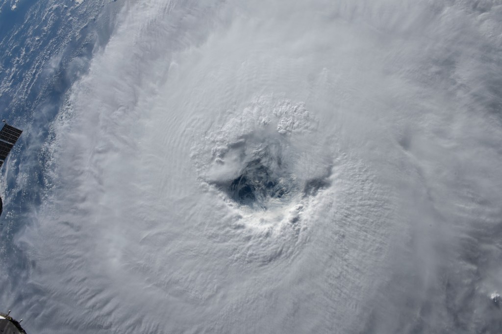 Category 1 Hurricane Nigel, with its ragged eye, is pictured on a northeasterly track in the Atlantic Ocean as the International Space Station orbited 259 miles directly above.