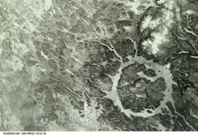 SS002-E-5164 (March 2001) --- The Manicouagan Impact Crater reservoir in Quebec, Canada, was photographed early in the mission by one of the Expedition Two crewmembers using a digital still camera.