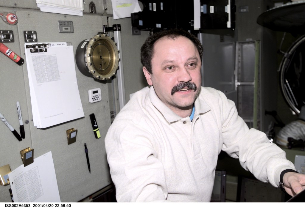 Cosmonaut Yury V. Usachev, Expedition Two commander, sets out to perform a task in the Zvezda Service Module on the International Space Station (ISS). The Rosaviakosmos cosmonaut and two astronauts are in the early stages of a lengthy stay aboard the orbiting outpost. The image was recorded with a digital still camera.
