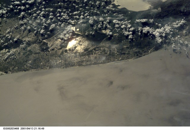 From the International Space Station (ISS), an Expedition Two crew member photographed part of the Atlantic coast side of southern Florida. The eastern side of Lake Okeechobee is at upper right. Miami and Miami Beach can be seen in another frame (5466) from this series of images, recorded with a digital still camera.