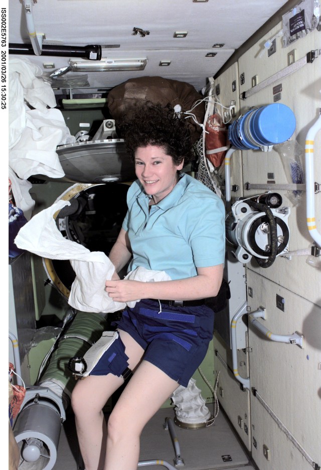 ISS002-E-5763 (26 March 2001) --- Astronaut Susan J. Helms, Expedition Two flight engineer, is pictured in the Zarya or Functional Cargo Block (FGB) of the International Space Station (ISS). Helms has spent about two and half weeks aboard the orbiting outpost, which will be her home for the next several months. The photo was recorded with a digital still camera.