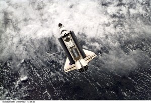 A view of the Space Shuttle Endeavour preparing to dock with the International Space Station (ISS) during the STS-100 mission. The STS-100 crewmembers are delivering the Canadarm2, Space Station Remote Manipulator System (SSRMS), and equipment stowed in the Multipurpose Logistics Module (MPLM) Raphaello to the ISS which are visible in Endeavour's payload bay. The image was taken with a digital still camera.