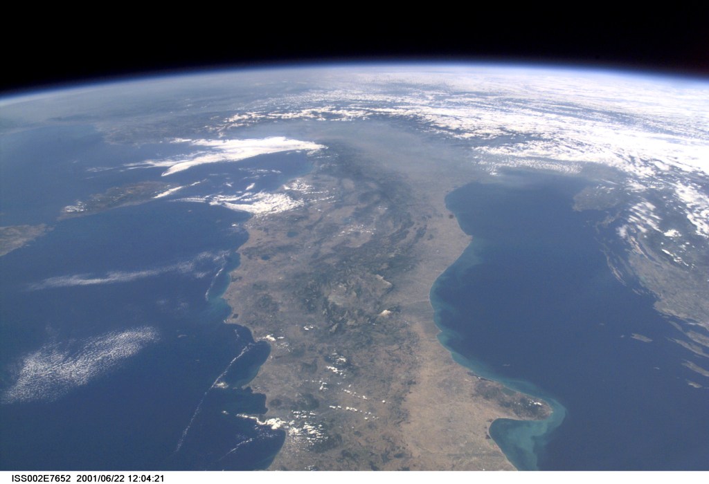Almost a full length view of mainland Italy, with Corsica visible off the west (left) coast, was captured with a digital still camera by an Expedition Two crew member aboard the International Space Station (ISS).