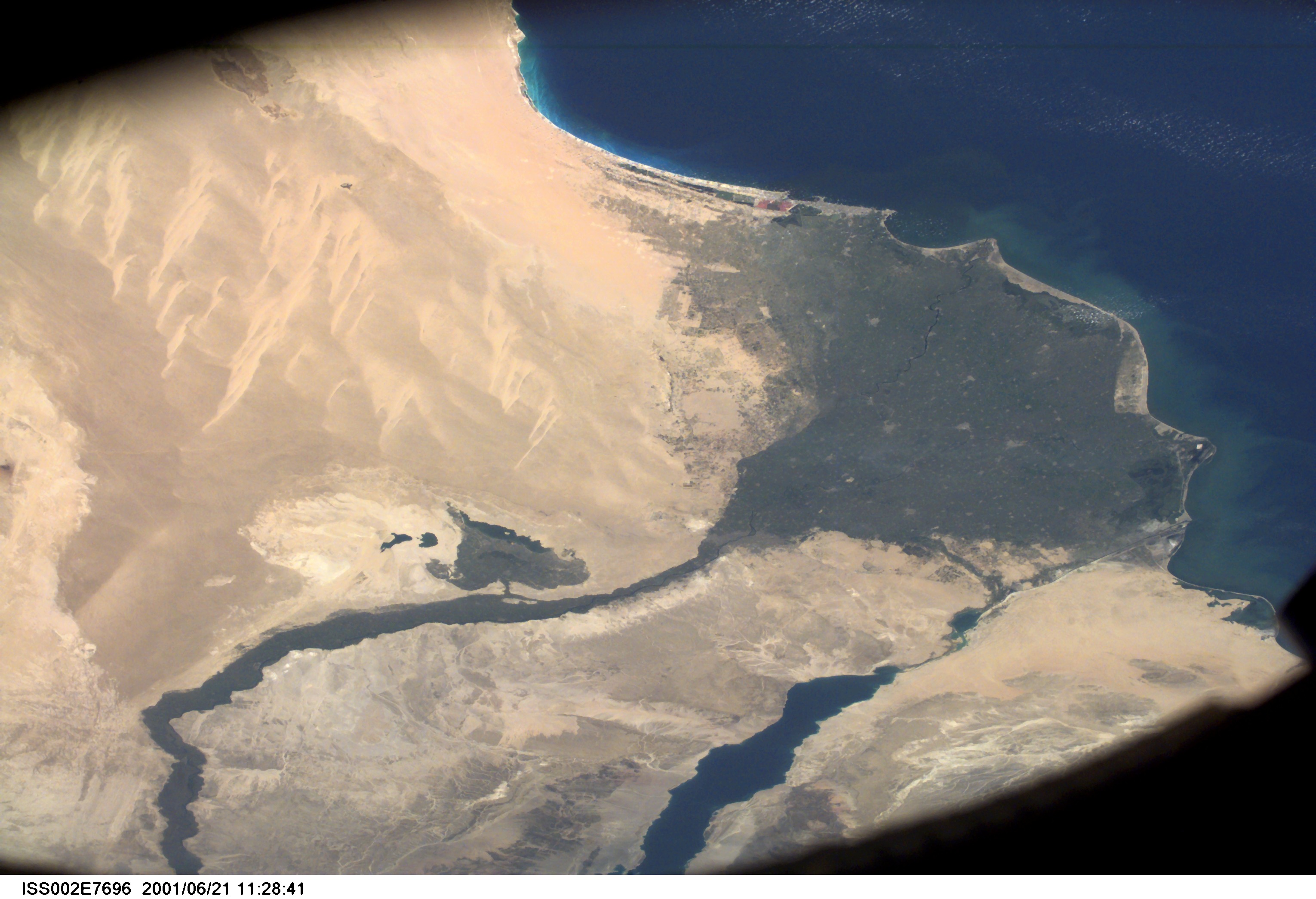 Wide view of the Nile River and Suez Canal, Egypt, as photographed with a digital still camera aboard the International Space Station (ISS).
