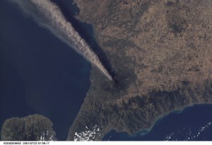 Smoke and ash combine to create a plume extending from the erupting volcano on Mt. Etna in Sicily. The digital still image was recorded by one of the Expedition Two crew members.