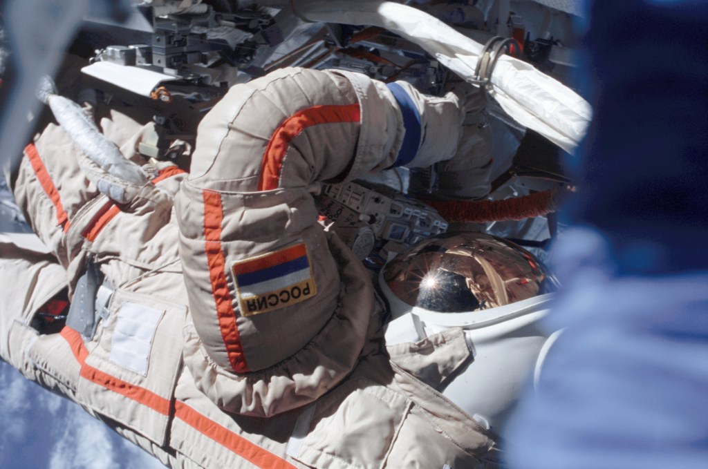 Cosmonaut Vladimir N. Dezhurov, Expedition Three flight engineer, works near the International Space Station (ISS) during the third Expedition Three session of extravehicular activity (EVA).