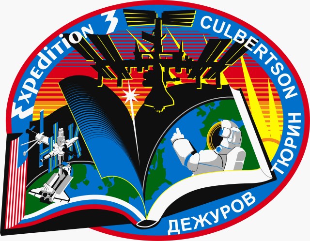 The Expedition Three crew members--astronaut Frank L. Culbertson, Jr., commander, and cosmonauts Vladimir N. Dezhurov and Mikhail Tyurin, flight engineers--had the following to say about the insignia for their scheduled mission aboard the International Space Station (ISS): “The book of space history turns from the chapter written onboard the Russian Mir Station and the U.S. Space Shuttle to the next new chapter, one that will be written on the blank pages of the future by space explorers working for the benefit of the entire world. The space walker signifies the human element of this endeavor. The star representing the members of the third expedition, and the entire multi-national Space Station building team, streaks into the dawning era of cooperative space exploration, represented by the image of the International Space Station as it nears completion.”