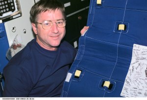 Astronaut Frank L. Culbertson, Jr., Expedition Three mission commander, assembles the Temporary Sleep Station (TESS) in the U.S. Laboratory.