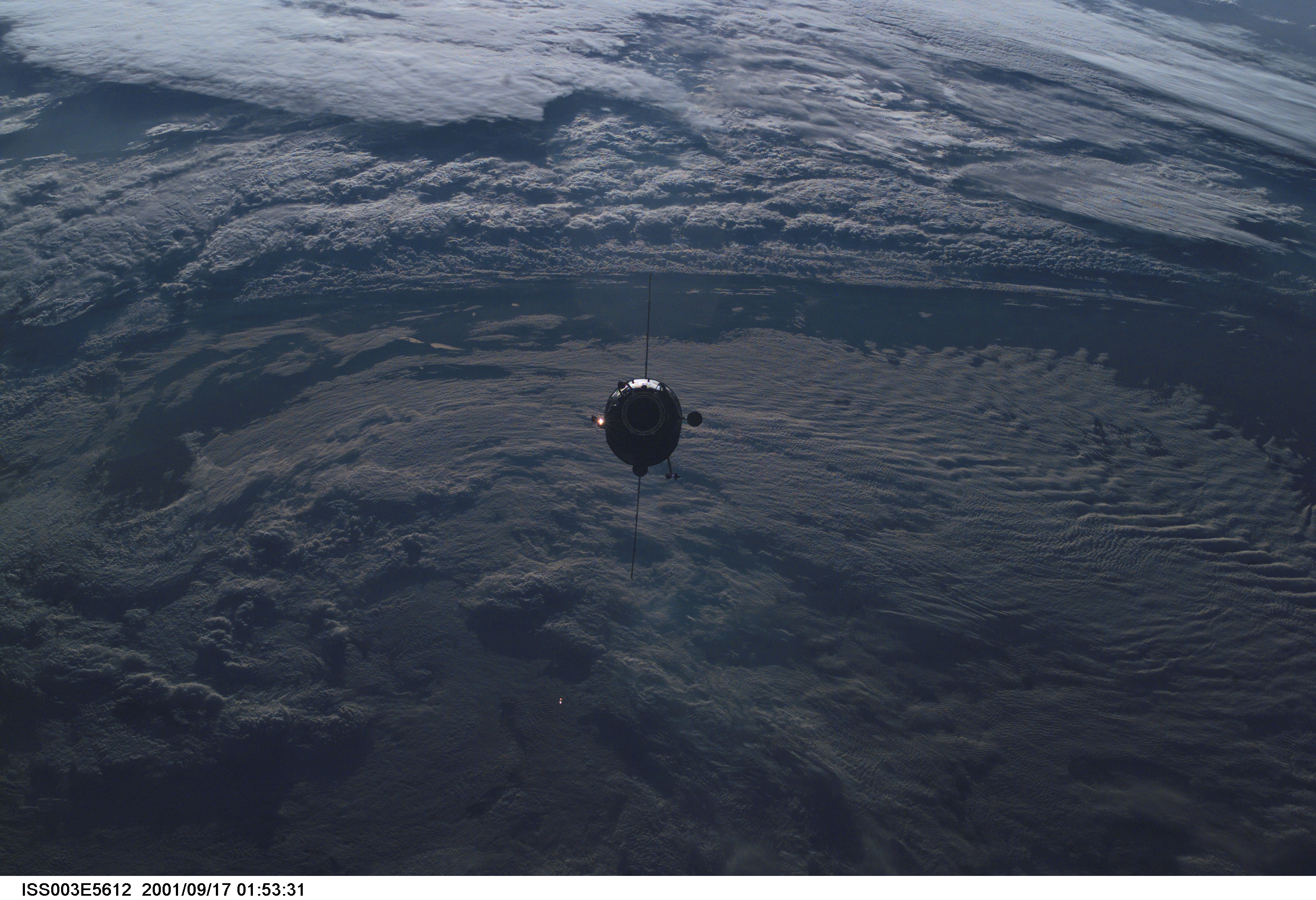 The Russian docking compartment Pirs approaches the International Space Station (ISS). The Pirs will provide a docking port for future Russian spacecraft as well as an airlock for extravehicular activities (EVA).