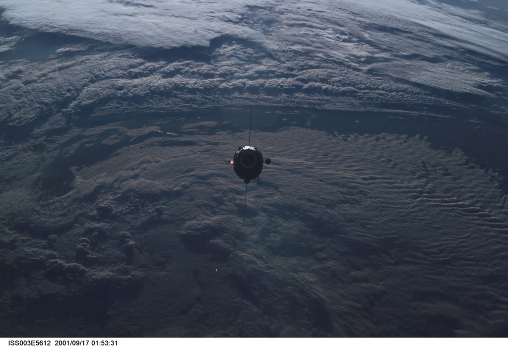 The Russian docking compartment Pirs approaches the International Space Station (ISS). The Pirs will provide a docking port for future Russian spacecraft as well as an airlock for extravehicular activities (EVA).