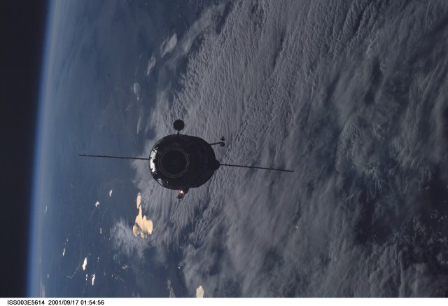 The Russian docking compartment Pirs approaches the International Space Station (ISS). The Pirs will provide a docking port for future Russian spacecraft as well as an airlock for extravehicular activities (EVA).