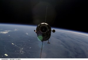 Appearing almost as a silhouette backdropped against Earth's horizon, the Russian Docking Compartment, named Pirs (the Russian word for pier), approaches the International Space Station (ISS). One of the Expedition Three crew members, using a digital still camera with a 70mm lens, recorded the image from onboard the orbital outpost. The vehicle was launched on September 14, 2001 and docking occurred on September 16.