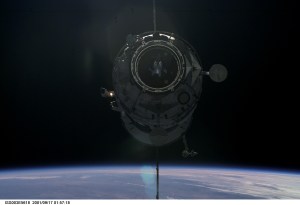 The Russian docking compartment Pirs approaches the International Space Station (ISS). The Pirs will provide a docking port for future Russian spacecraft as well as an airlock for extravehicular activities (EVA).