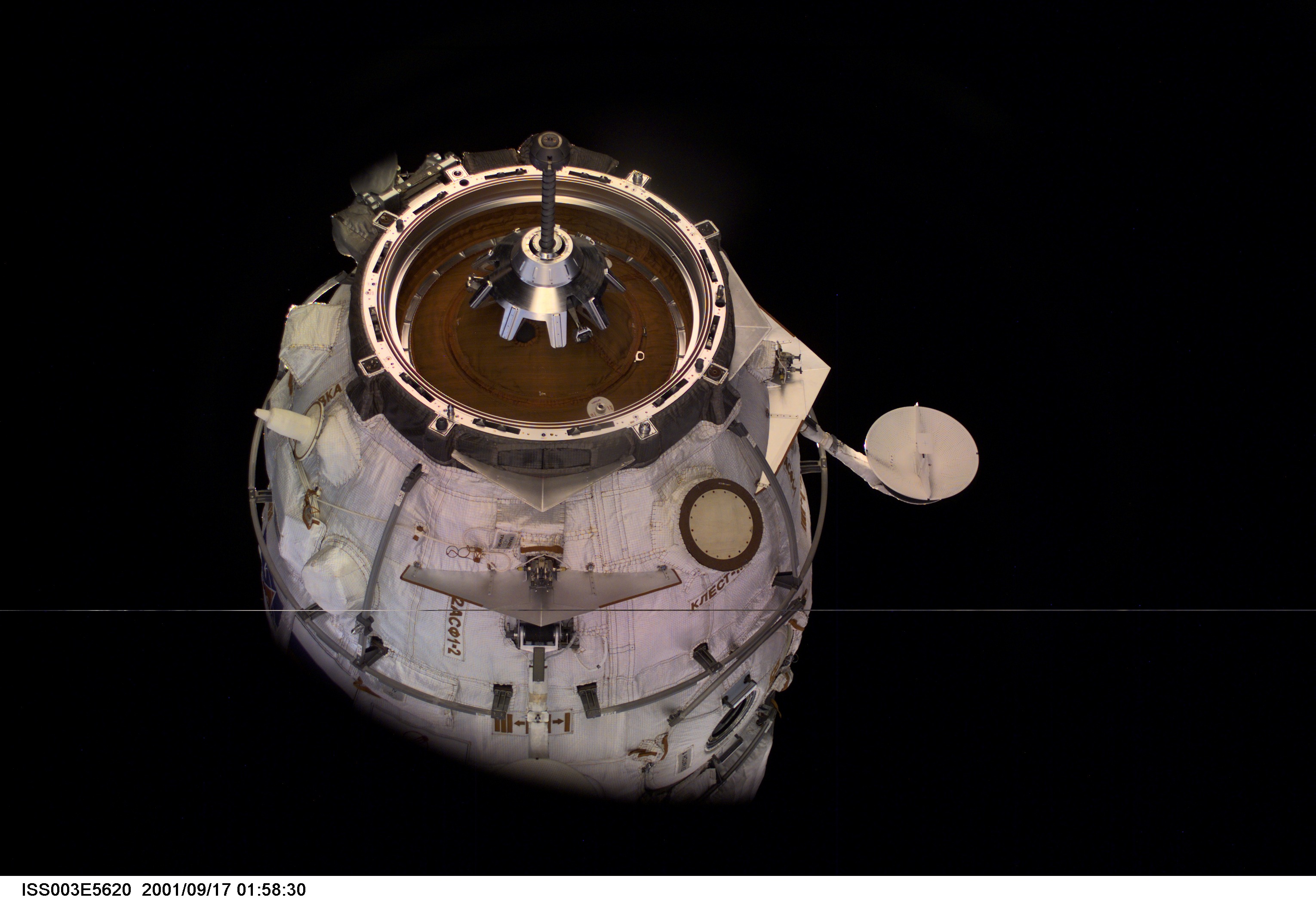 The Russian Docking Compartment, named Pirs (the Russian word for pier), is only seconds away from docking with the International Space Station (ISS). One of the Expedition Three crew members, using a digital still camera with a 35mm lens, recorded the image from onboard the orbital outpost. The vehicle was launched on September 14, 2001 and docking occurred on September 16.