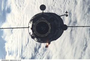 The Russian Docking Compartment, named Pirs, the Russian word for pier, approaches the International Space Station (ISS). One of the Expedition Three crew members, using a digital still camera with a 180mm lens, recorded the image from onboard the orbital outpost. The vehicle was launched on September 14, 2001 and docking occurred on September 16.