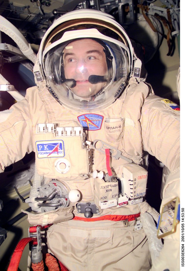 Cosmonaut Vladimir N. Dezhurov, Expedition Three flight engineer, wears the Russian Orlan space suit as he prepares for an upcoming spacewalk from the Pirs Docking Compartment on the International Space Station (ISS). The first spacewalk is scheduled for October 8, 2001 which will be the first extravehicular activity (EVA) from the station without a Space Shuttle present. Dezhurov represents Rosaviakosmos. This image was taken with a digital still camera.
