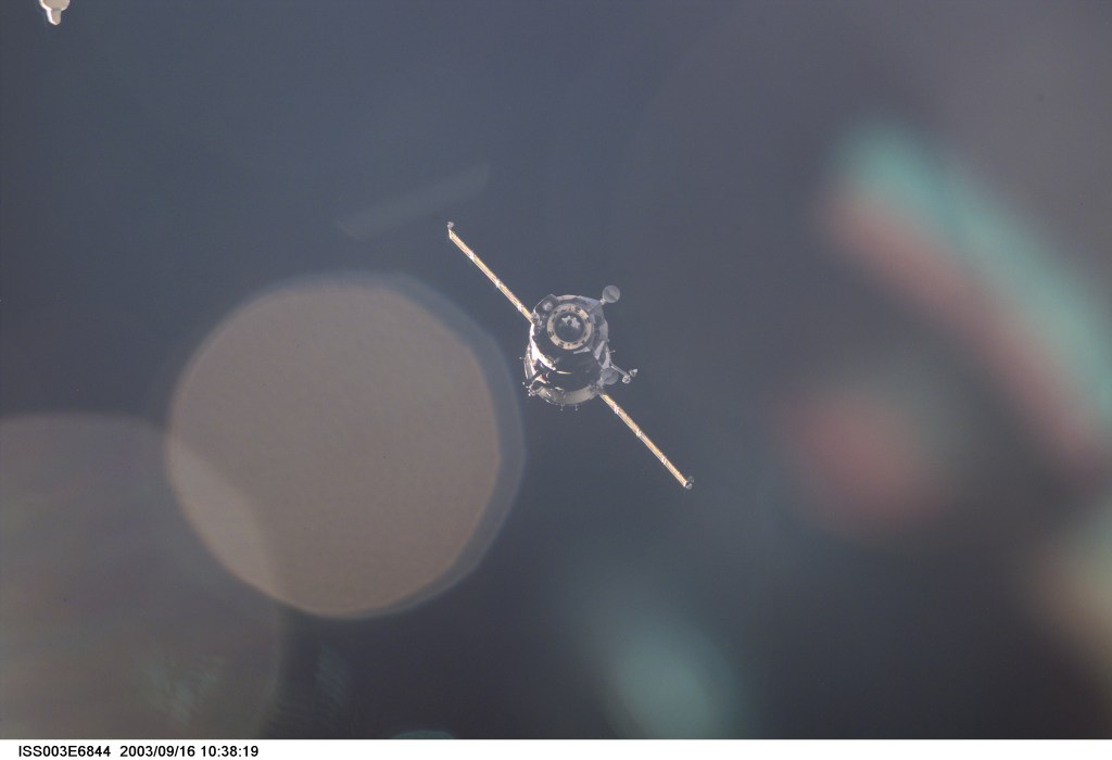 A Soyuz spacecraft approaches the International Space Station (ISS) carrying the Soyuz taxi crew, Commander Victor Afanasyev, Flight Engineer Konstantin Kozeev and French Flight Engineer Claudie Haignere for an eight-day stay on the station. Afanasyev and Kozeev represent Rosaviakosmos, and Haignere represents ESA, carrying out a flight program for CNES, the French Space Agency, under a commercial contract with the Russian Aviation and Space Agency. This image was taken with a digital still camera.